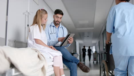 young caucasian girl consults with a doctor in a hospital, with copy space