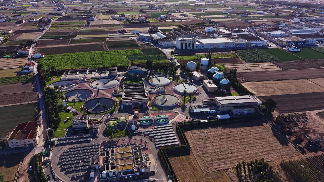 Wastewater treatment facility in Spain with multiple circular tanks