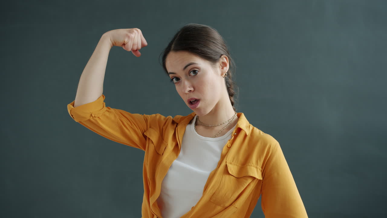 Woman Flexing Her Biceps