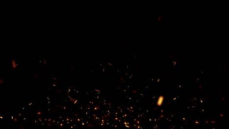 fire sparks dust particles action background for screen overlay. 4k 3d seamless loop animation dust and orange fiery. abstract particle dust burning hot sparks random flowing on black background.