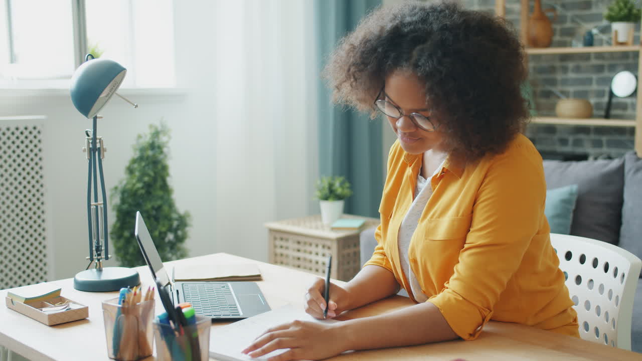 Young Woman Studying at Home