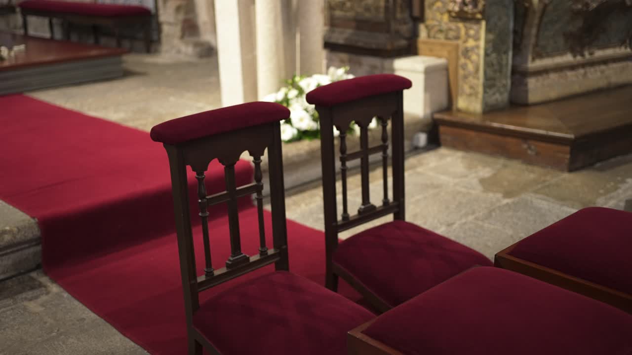 Empty Chairs Await the Wedding Couple in a Church