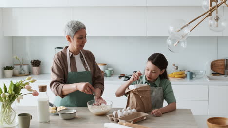 grandma and girl baking