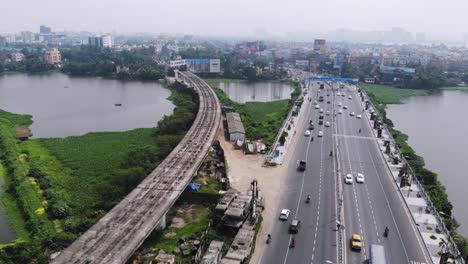 Beautiful-aerial-shot-of-India's-highway-with-metro-construction-work-for-a-new-India-in-Kolkata