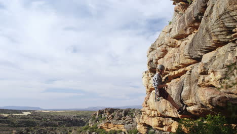 mountaineer adjusting the rope 4k