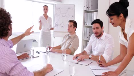 confident businesswoman giving a presentation