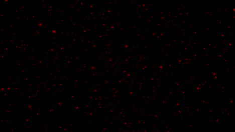 los corazones se mueven o parpadean en la pantalla negra. el fondo del día de san valentín. el símbolo del amor en movimiento gráfico.