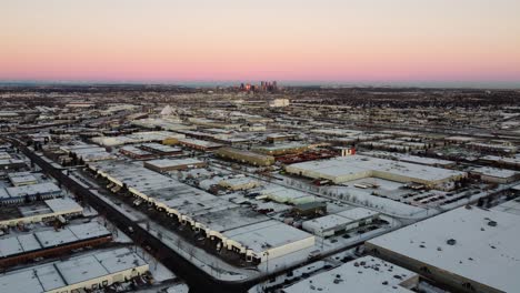 golden sunrise reflections: calgary downtown in winter sunlight