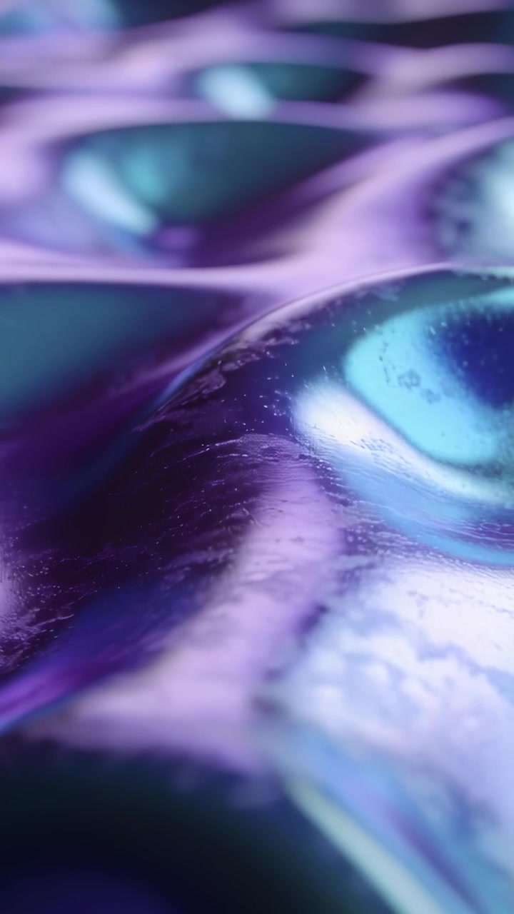 Vertical video: Gliding camera showing glossy surface in studio, highlighting turquoise pools