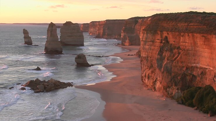Rock Formations Known As The Twelve Apostles Stand Out On The Australian Coast 1