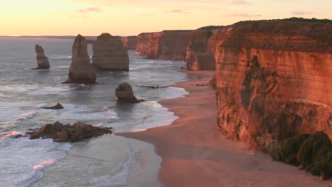 rock formations known as the twelve apostles stand out on the australian coast 1