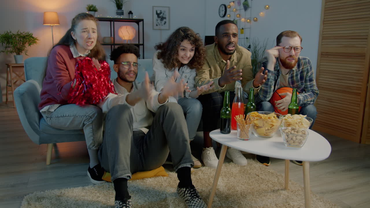 Friends watching a basketball game