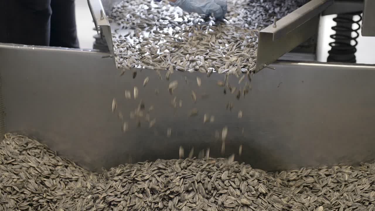 ⁇ 꽃 씨 ⁇  을 가진 컨베이어 의 근접 촬영