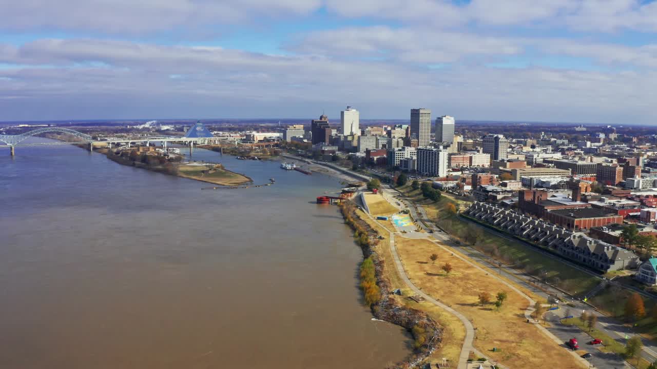 Aerial video of Memphis, Tennessee over the Mississippi River. Video was taken in November under partly cloudy skies.