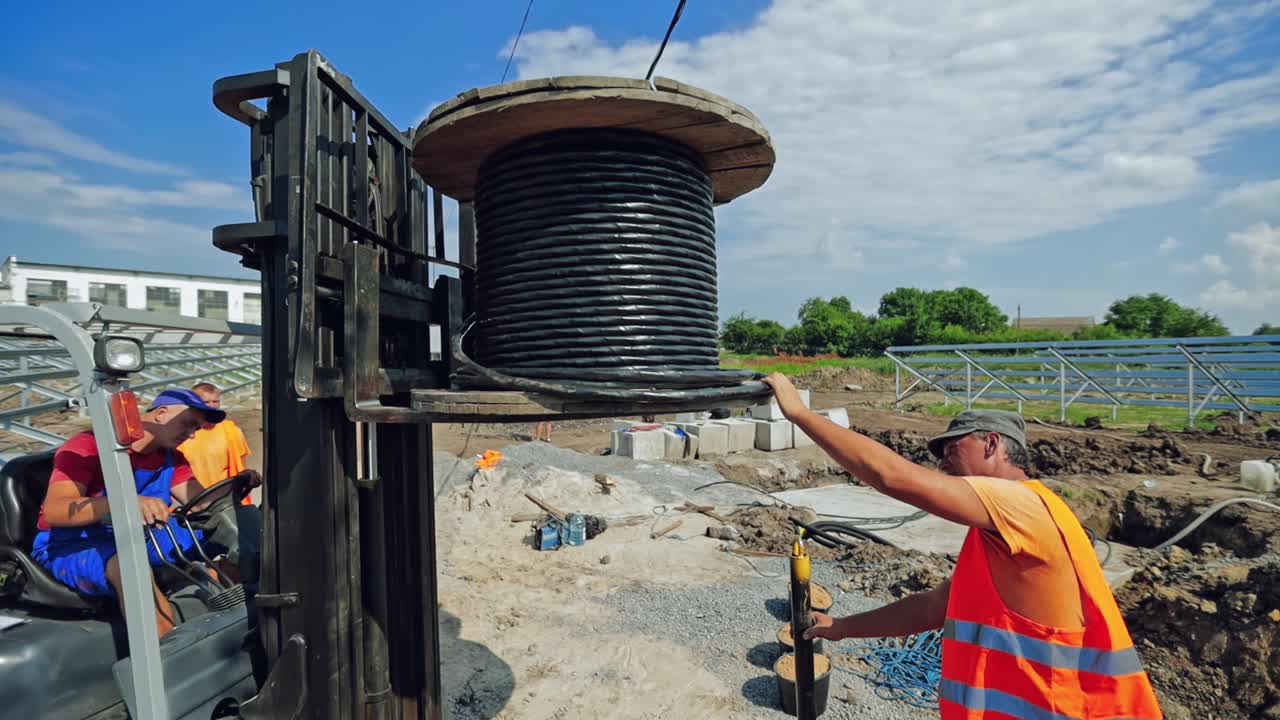 Industrial Construction Site. Group of workers at construction site