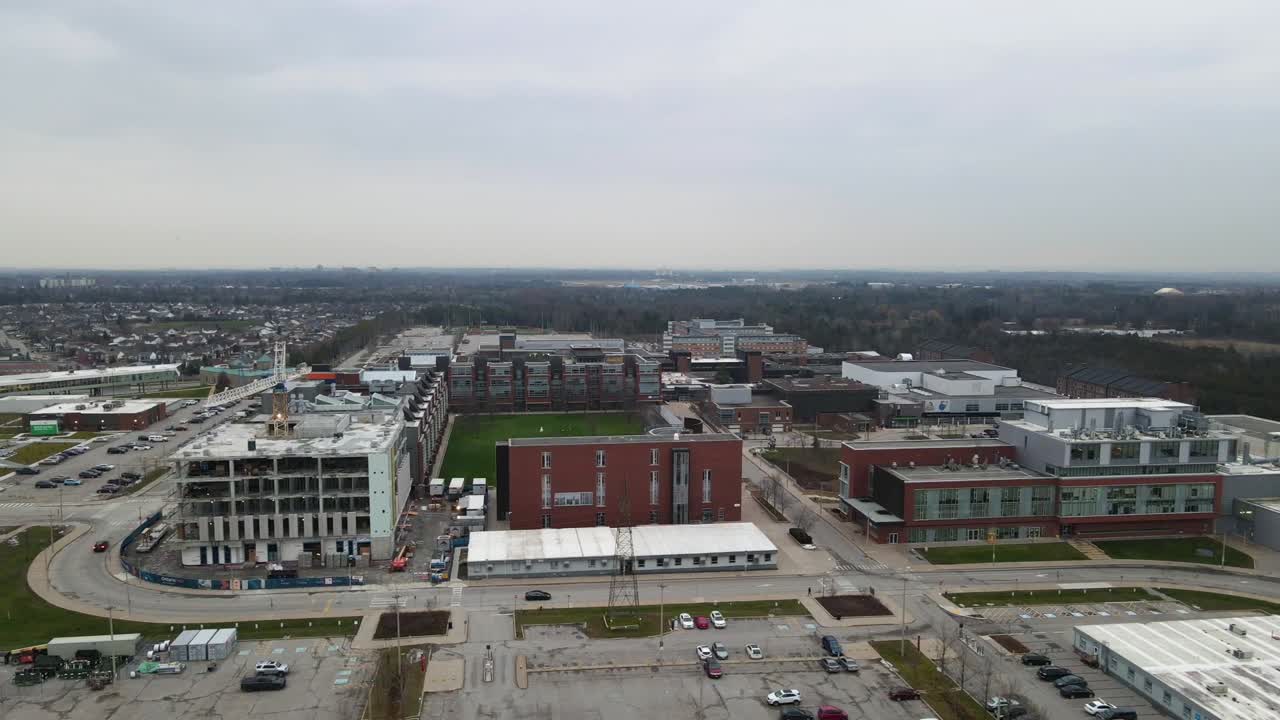 Aerial shot of industrial buildings in Oshawa on an overcast day