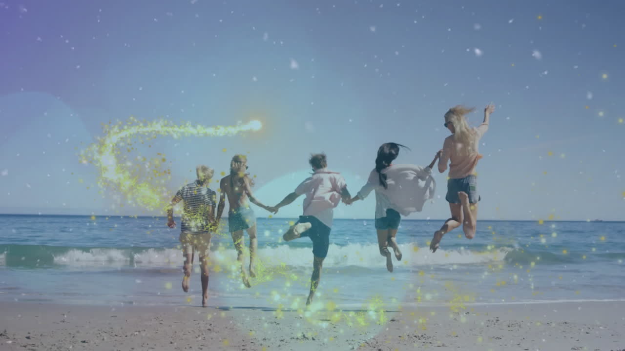 Jumping on beach with sparkling light effects, group creating lively animation