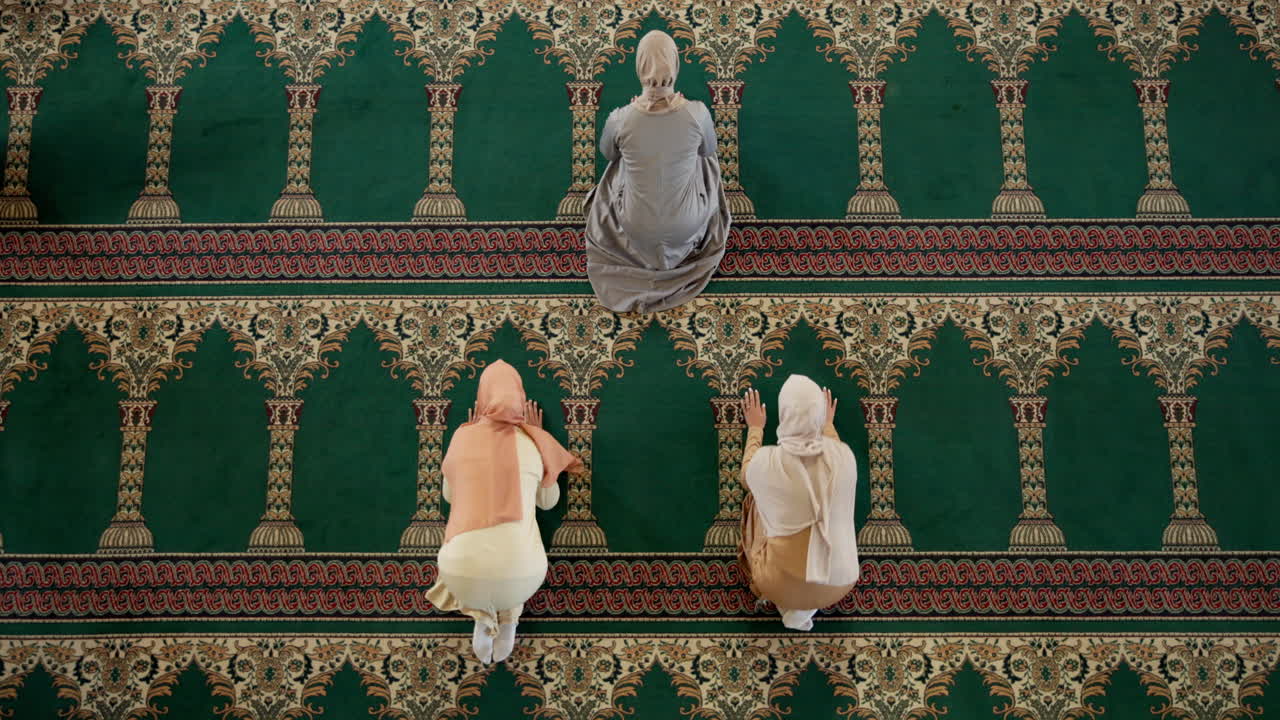 Muslim women praying in mosque