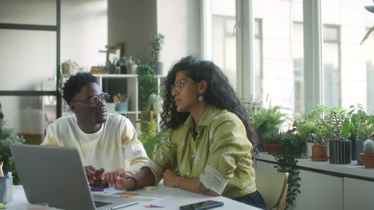 Diverse Colleagues Working Together in Office