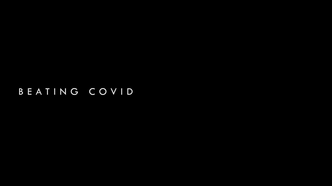 Testo animato elegante "Sconfiggere il Covid" - grafica animata motion graphics con sfondo nero sostituibile