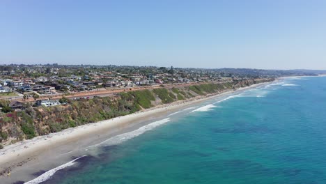 aerial view of a coastal city and sand beaches on a summer day in california