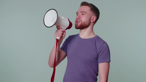 smiling bearded man talking with megaphone, proclaiming news, loudly announcing sale advertisement