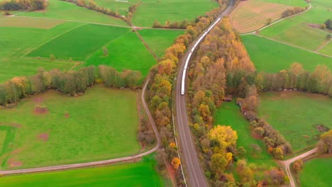 aerial-view-train-autumn-forest