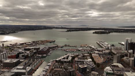 auckland cbd, viaduct harbour, city port, waitemata harbour with boats and ferries, new zealand. aerial drone panoramic view