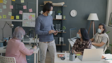 team meeting in a modern office during pandemic