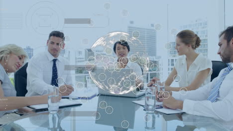animation of rotating globe and data processing over business colleagues talking at meeting