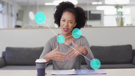 Animation-of-network-and-data-processing-over-african-american-businesswoman-in-office