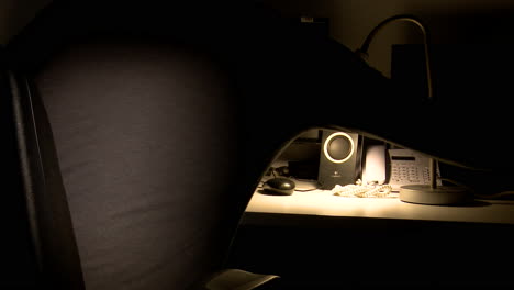 person working at a night desk