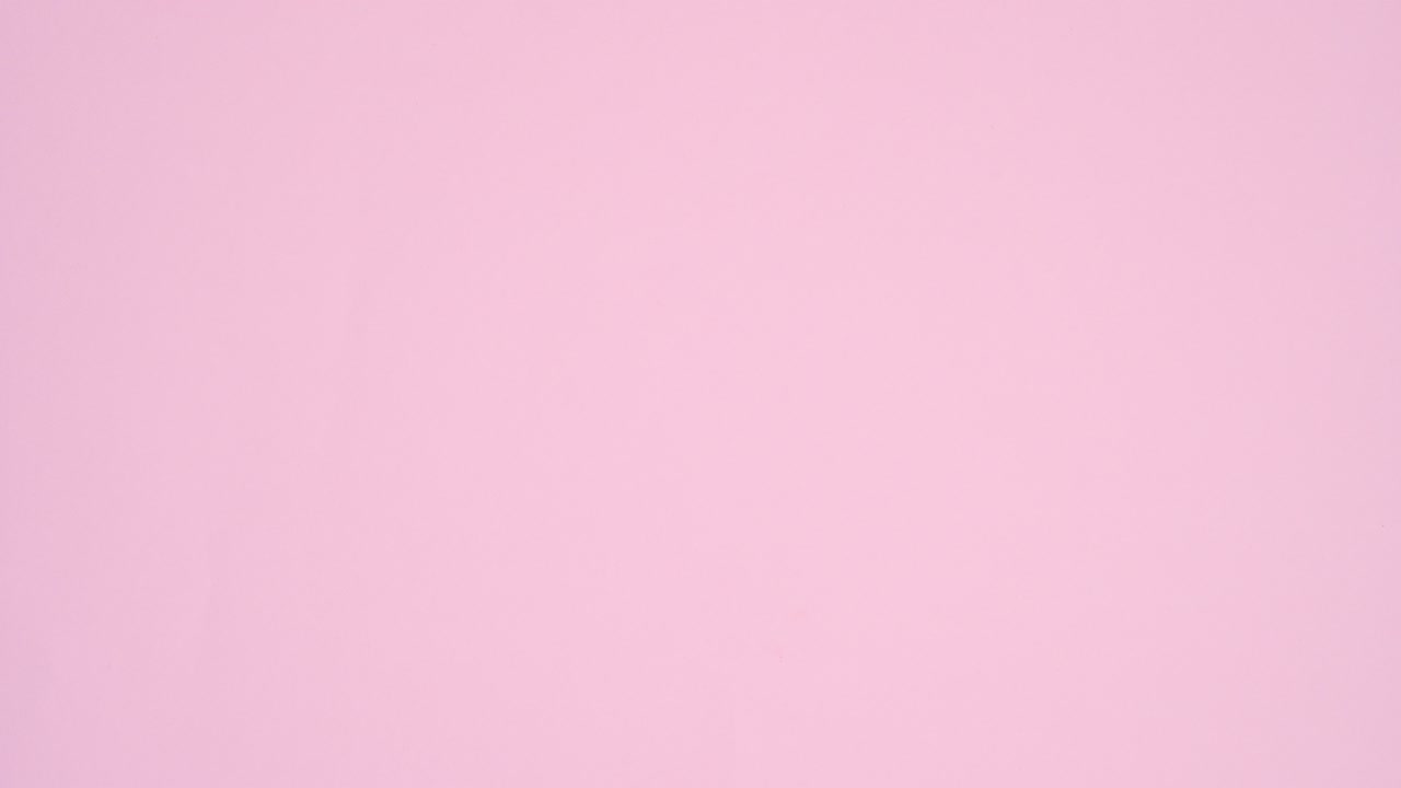 White paper for Valentine's day text appear with pink heart balloons. Stop motion