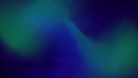 animation of blue and green smoke moving on abstract background, copy space