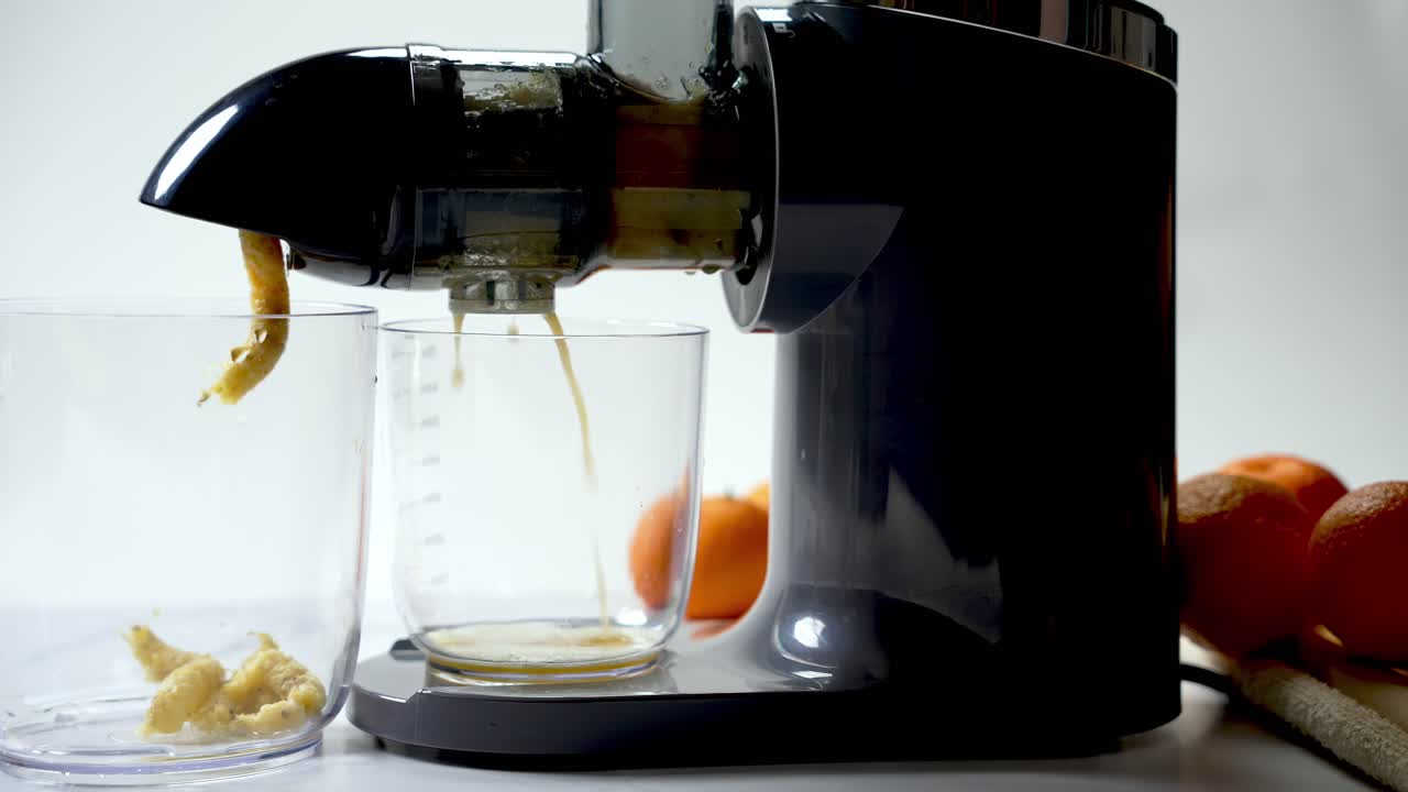 Smoothie drink making, kitchen appliances, fruit pulp, close-up view