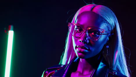 stylish woman in vibrant neon lit portraits