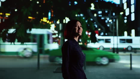 asian woman walking near city centre