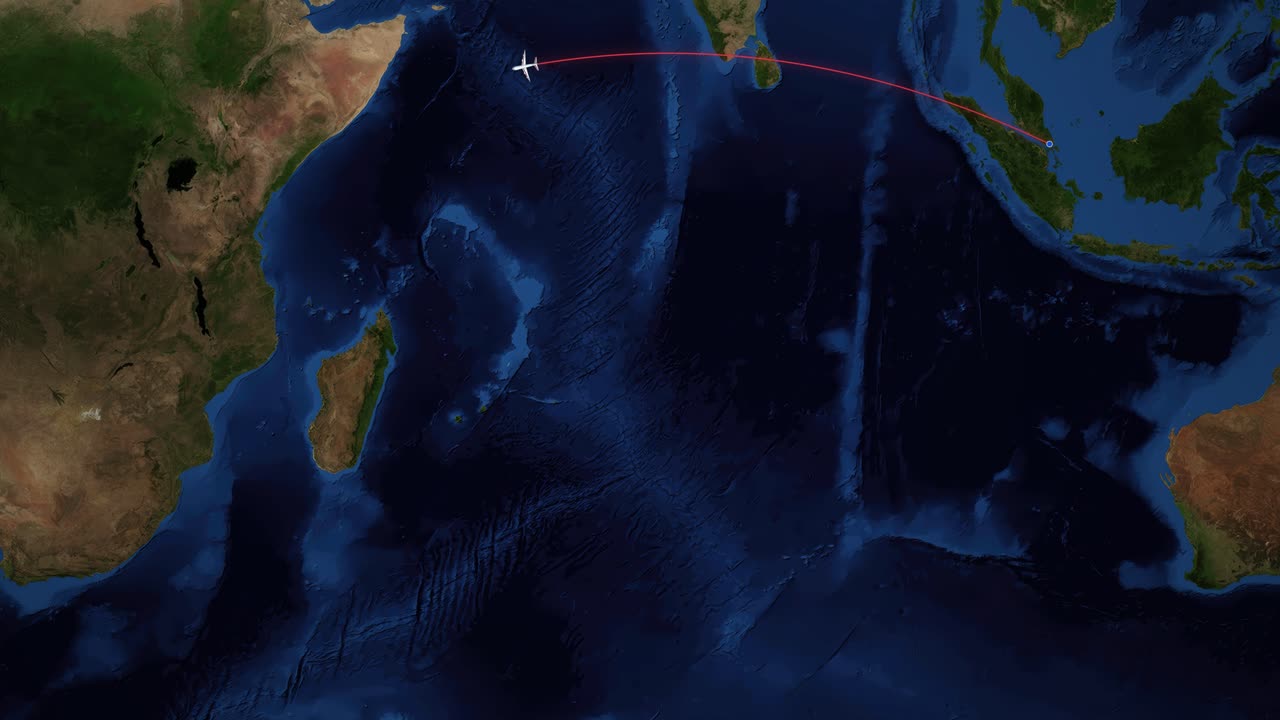 A red line tracks an airplane flying across the Indian Ocean from Singapore to Nairobi