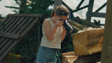 young girl photographer shooting wooden pattern young photographer shooting wooden pattern girl taking macro pictures of amazing nature upgrading photography skills spending leisure time outdoor