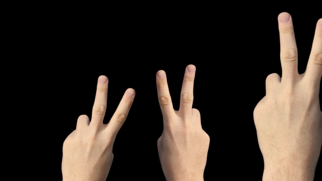 Diverse mani che mostrano il segno della pace su sfondo nero