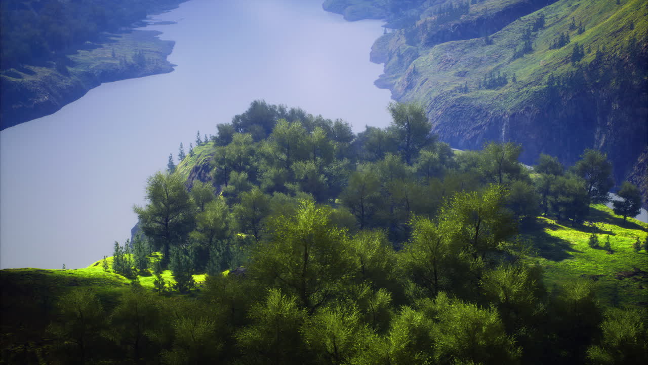 Breathtaking view of a serene river winding through lush green hills