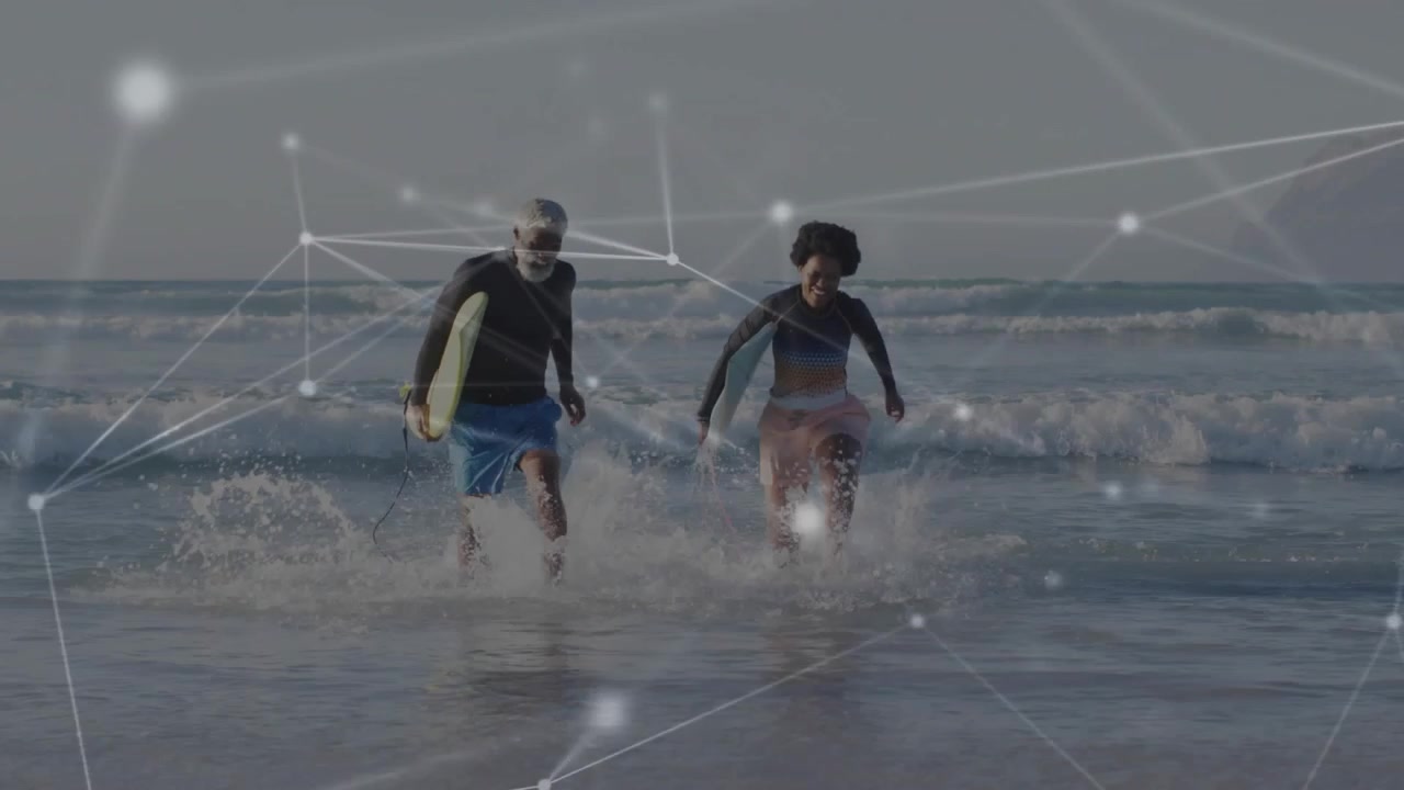 Two riders with boards starting in surf, running shoreward for sports as overlay moving over them