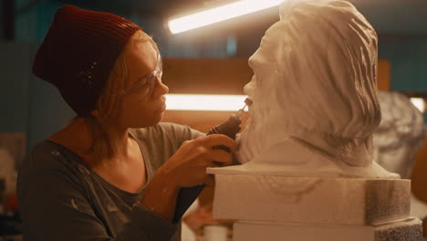 sculpting a bust in a studio