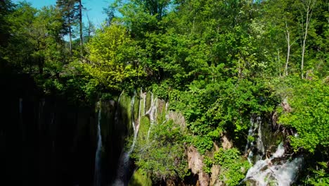 aerial of beautiful natural and green water fall in plitvice lakes in croatian national park "plitvička jezera