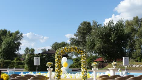 outdoor wedding ceremony by the pool