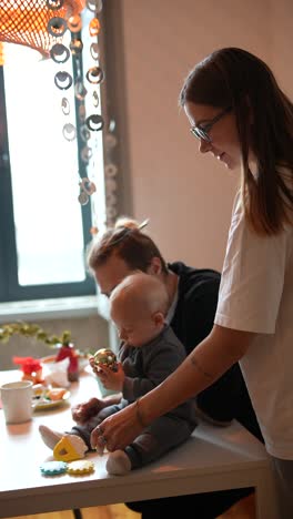 happy family playing with baby