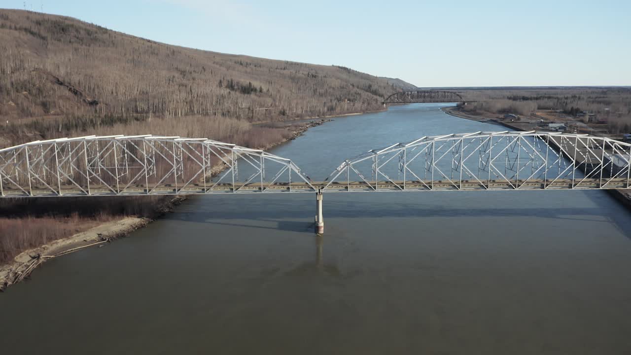 Drone backs away from bridge over river in Alaska