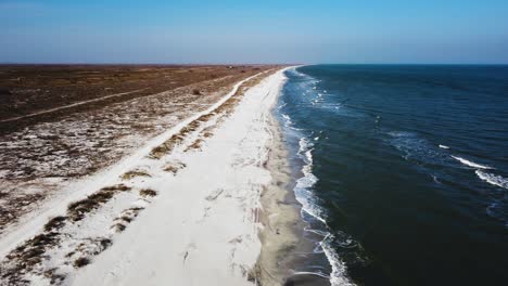 Aerial-shot-of-the-Black-Sea-coastline-at-Vadu,-Constanta-County,-Romania