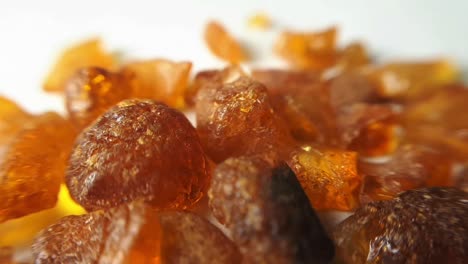 natural baltic amber stones on a white background