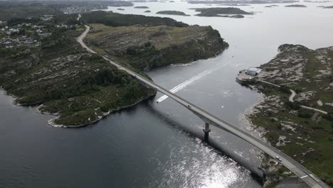 Cars-Driving-on-Road-Crossing-a-Bridge-in-Øygarden,-Norway-near-Bergen-with-Beautiful-Landscape